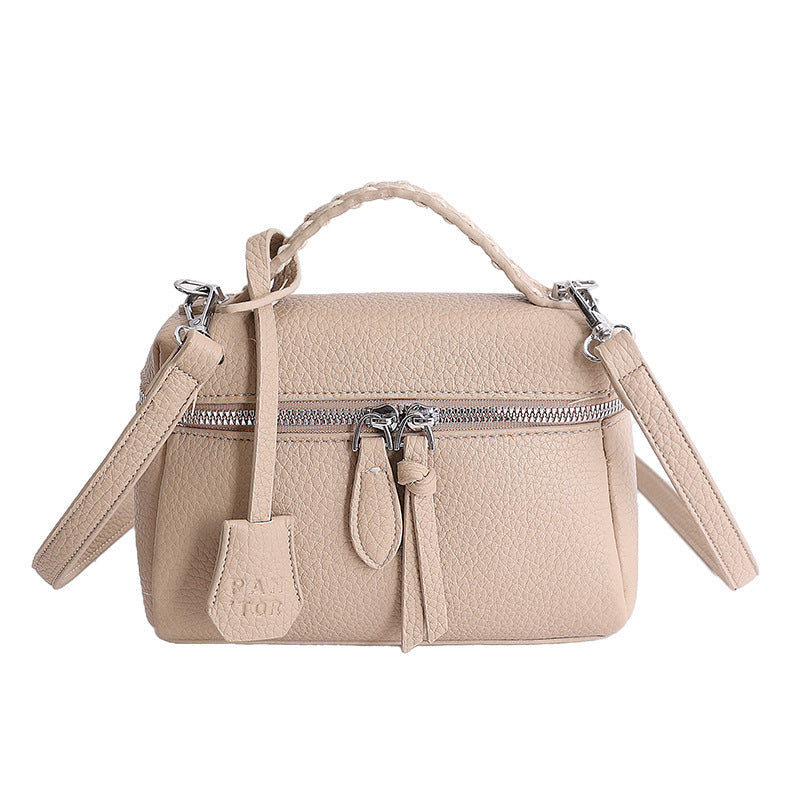 Women's mini handbag with fine decorative seams and detachable shoulder strap
