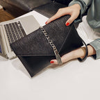 Women's clutch with stylish chain accent