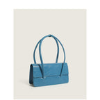 Ladies elegant handbag with minimalist silhouette