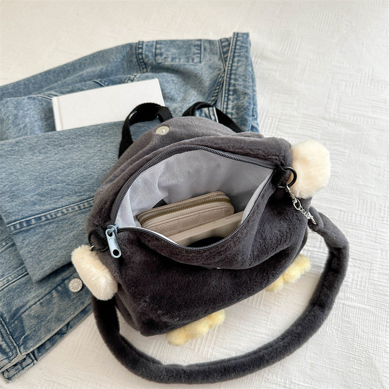 Plush backpack with cute penguin design
