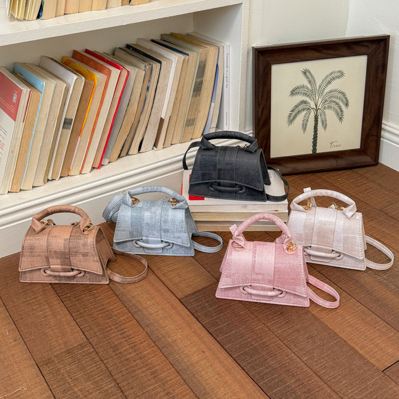 Women's elegant mini handbag with textured design