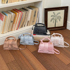 Women's elegant mini handbag with textured design
