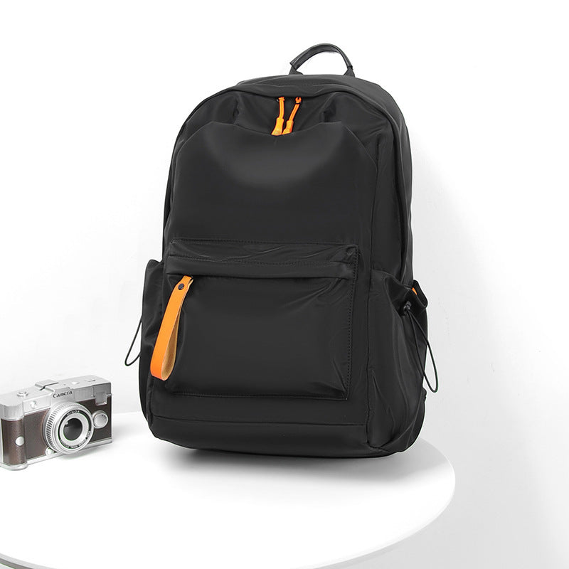 High-functional backpack with multiple compartments and ergonomic carrying elements
