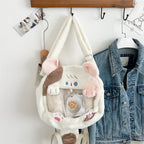 Plush handbag with transparent window