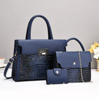 Ladies handbag set with luxurious crocodile leather look and removable clutch