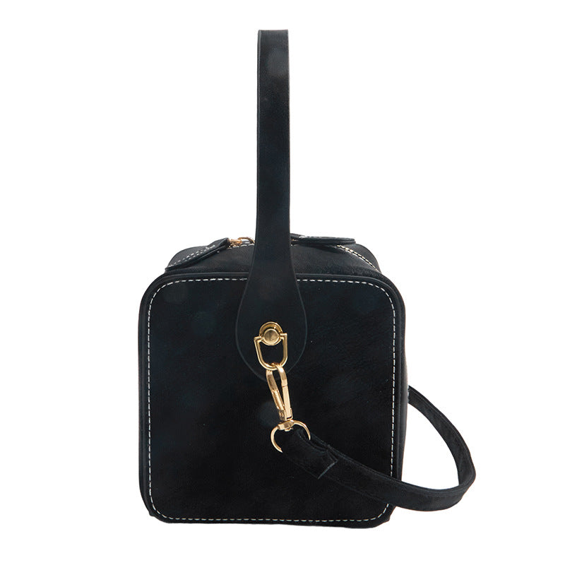 Ladies mini handbag with removable shoulder strap and elegant flap closure