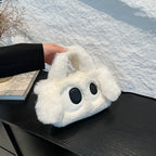 Cozy plush shoulder bag with ear application