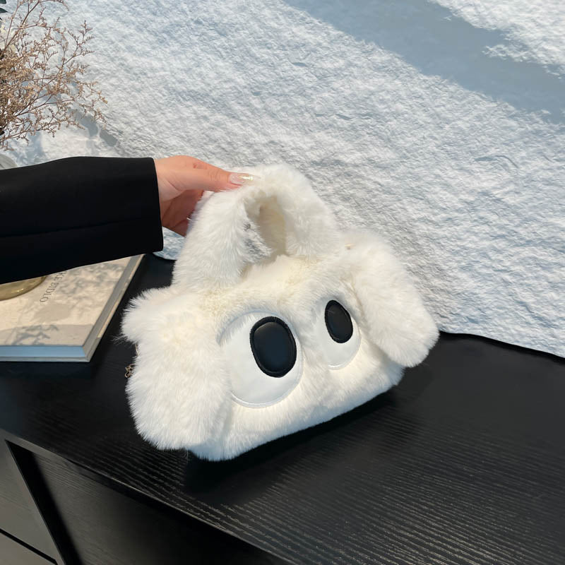 Cozy plush shoulder bag with ear application