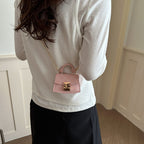 Women's mini handbag with decorative chain strap