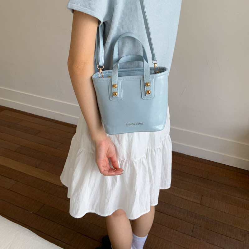 Ladies Mini-Handbag with elegant carry handle and practical inner compartment