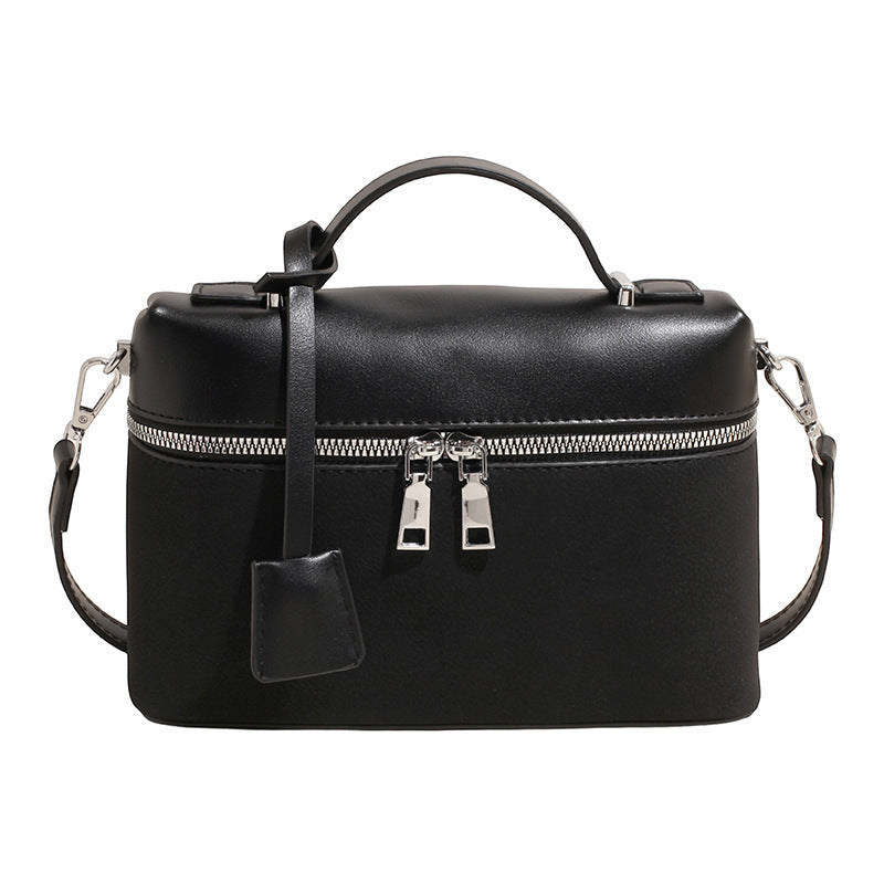 Women's mini shoulder bag with practical compartments