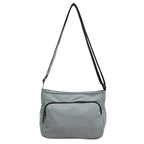 Practical shoulder bag with versatile storage compartments