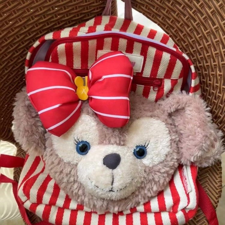 Plush backpack with playful animal design
