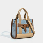 Women's mini handbag with trendy denim elements and practical drawstring