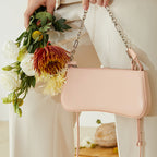 Women's elegant shoulder bag with chain accent