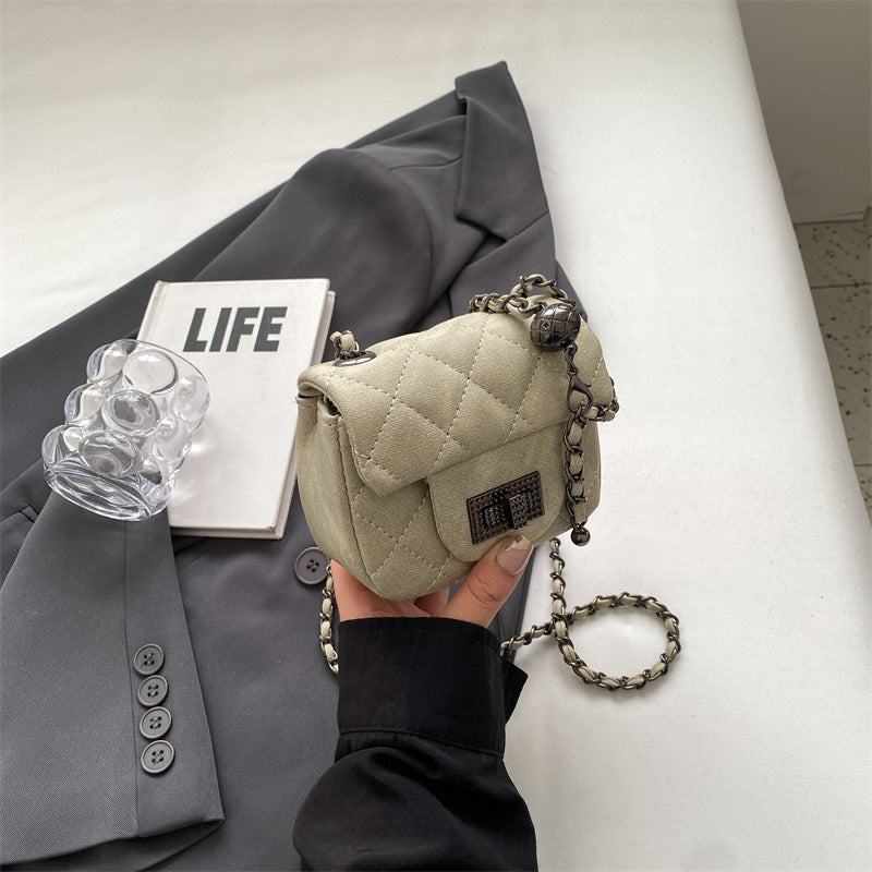 Women's mini handbag with padded design and elegant chain strap