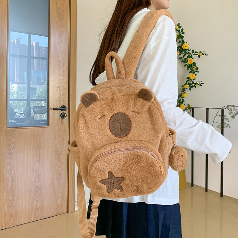 Plush backpack with animal motif and practical compartments