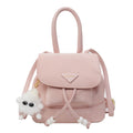 Women's mini backpack with playful design and plush pendant