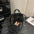 Women's mini bag with playful drawstring and shiny finish