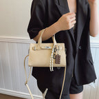 Ladies elegant mini bag with detachable pendant