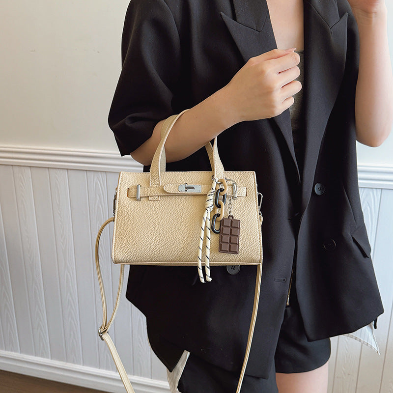 Ladies elegant mini bag with detachable pendant