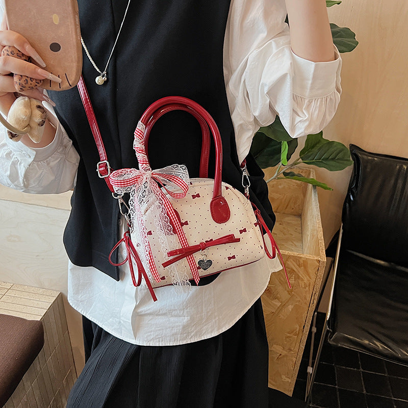Women’s mini bag with playful design and charming details