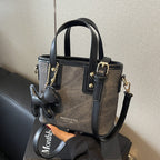 Women's mini handbag with removable charm