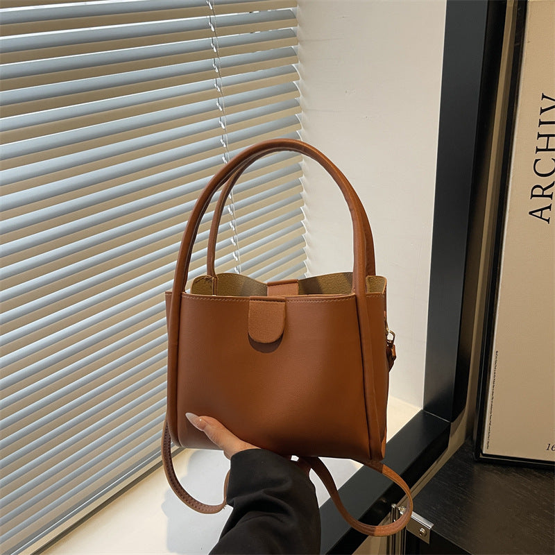 Ladies elegant mini handbag with practical flap closure