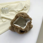 Cozy plush shoulder bag with ear application