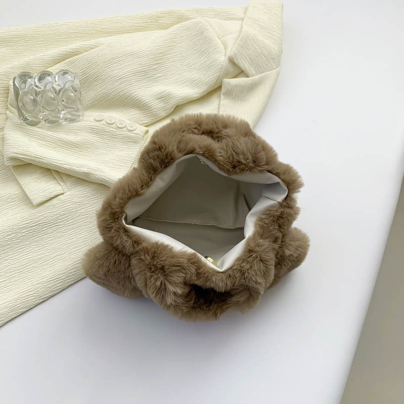 Cozy plush shoulder bag with ear application