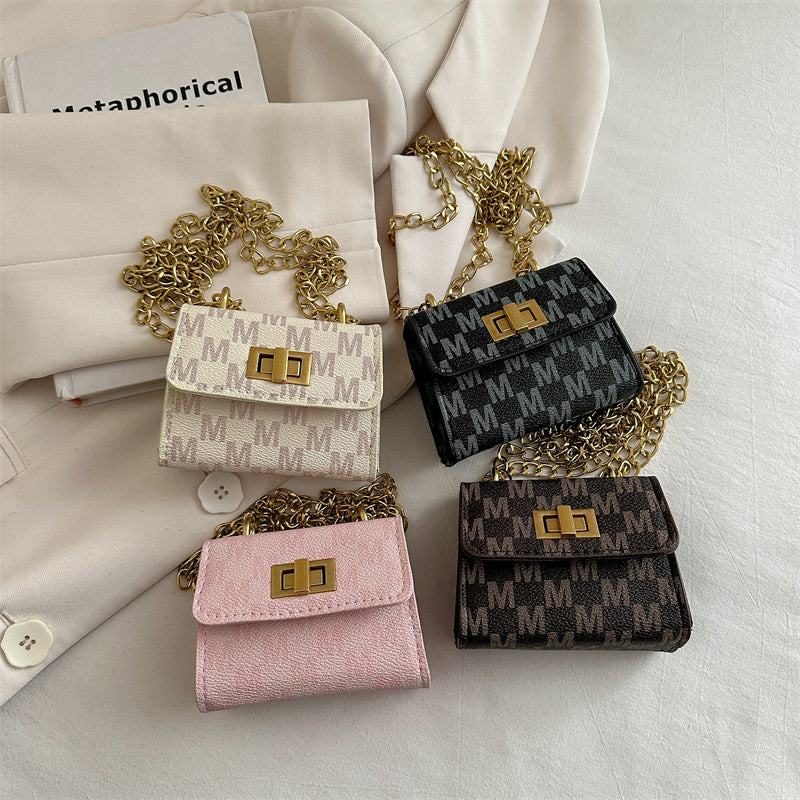 Ladies mini wallet with elegant chain decoration
