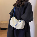 Fashionable shoulder bag with adjustable carrying strap