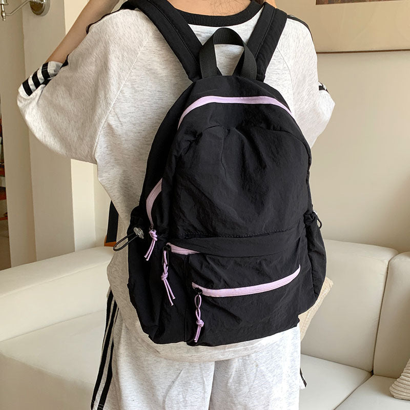 Everyday backpack with multifunctional pockets
