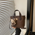 Ladies trendy mini bag with high-quality crocodile pattern and removable plush toy charm