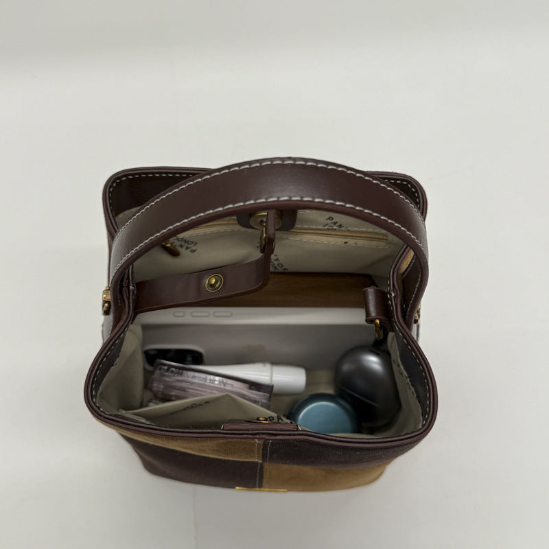 Women’s mini hobo bag made of high-quality suede leather with decorative stitching
