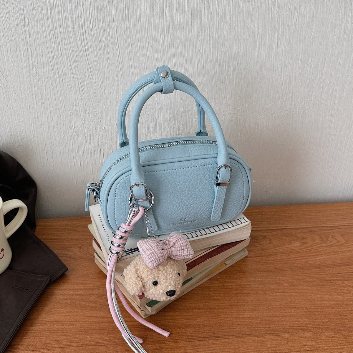Women's mini handbag with removable teddy keychain