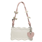 Women's mini handbag with creative wave pattern and playful pendant