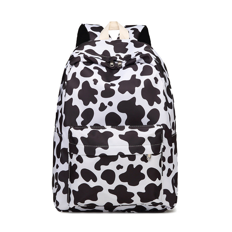 Stylish Cow Print Backpack and Accessory Set