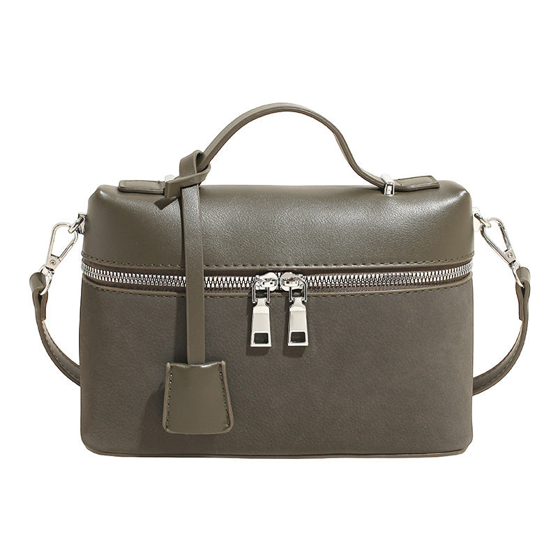 Women's mini shoulder bag with practical compartments