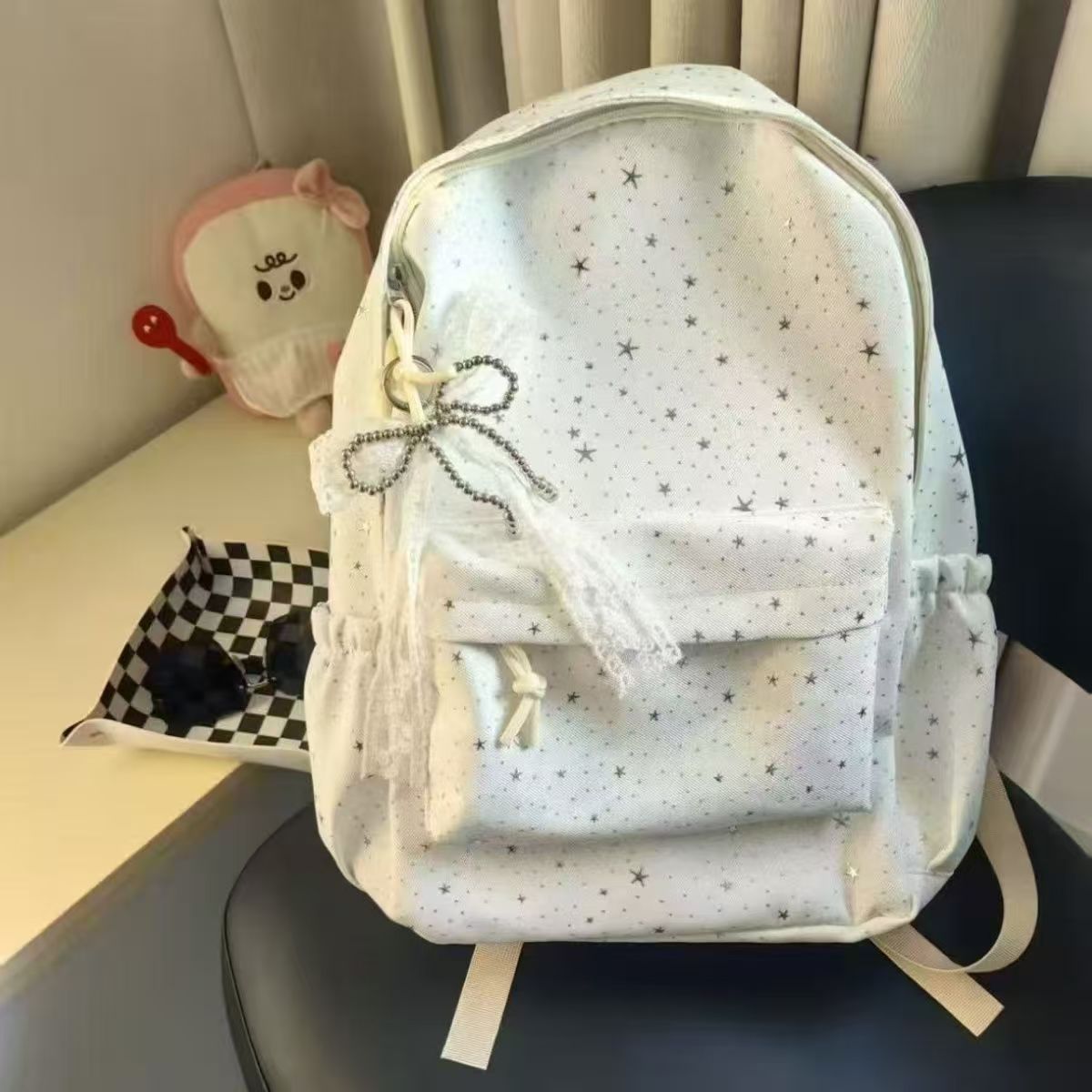 Backpack with Sparkling Star Design