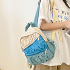 Backpack with Innovative, Versatile Compartment System and Elastic Design