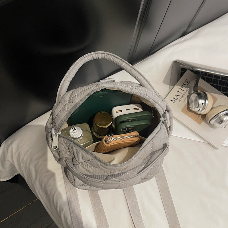Shoulder bag with padded inner compartments