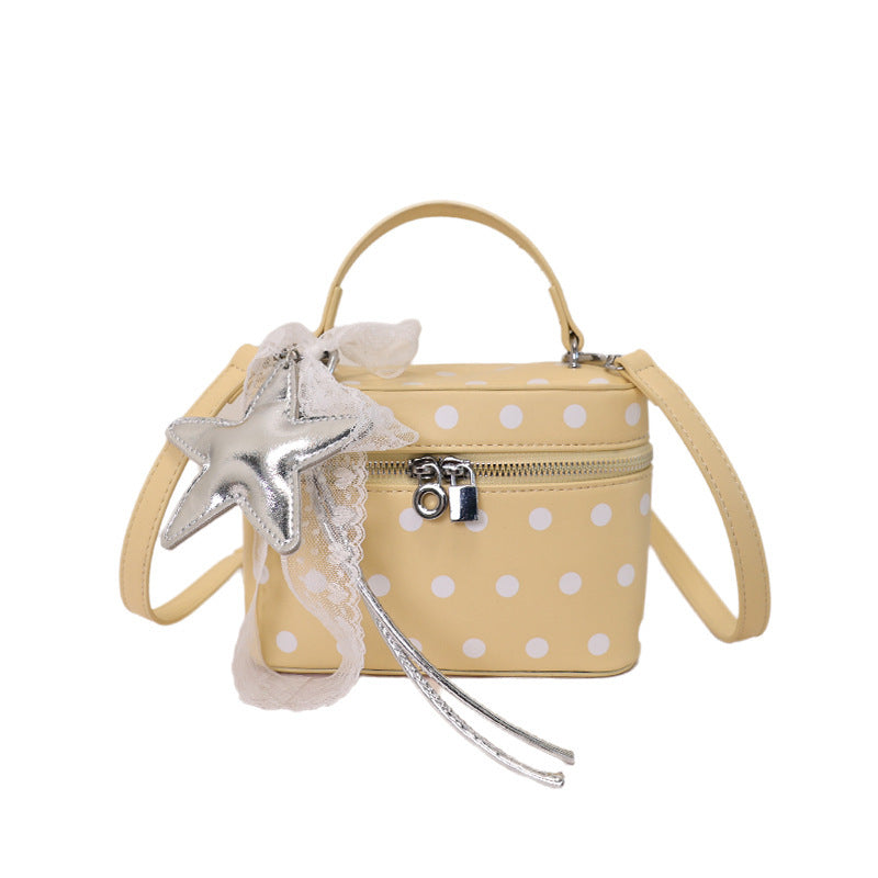 Women's mini handbag with playful design and elegant accents