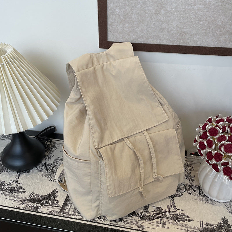 Versatile backpack with practical snap closure