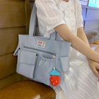 Tote bag with versatile compartments and ergonomic design