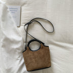 Ladies elegant handbag with high-quality suede and leather accents