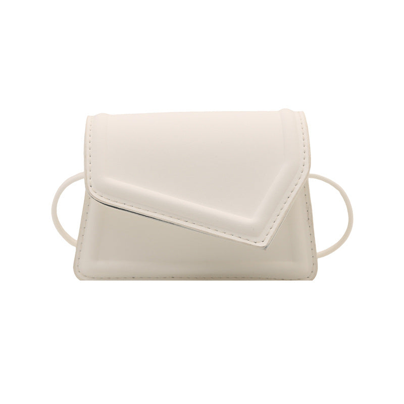 Women's mini handbag with elegant clasp closure technique