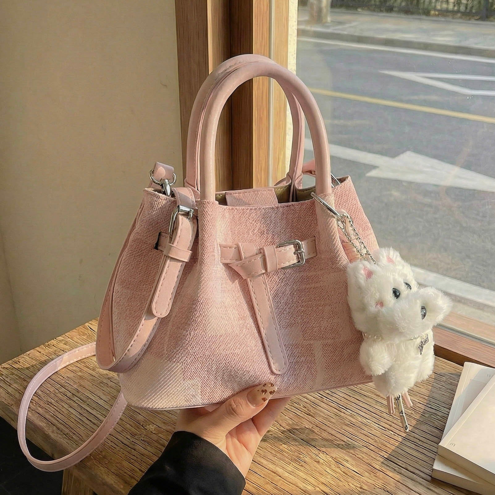 Women’s mini handbag with modern accents and practical interior organizer