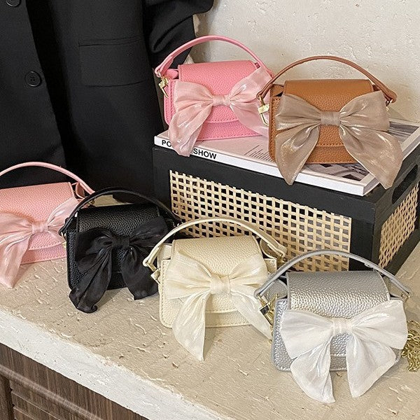 Ladies mini handbag with decorative bow design