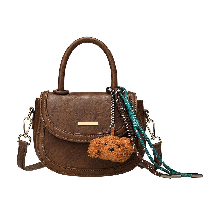 Women's mini handbag with playful detail and high-quality faux leather